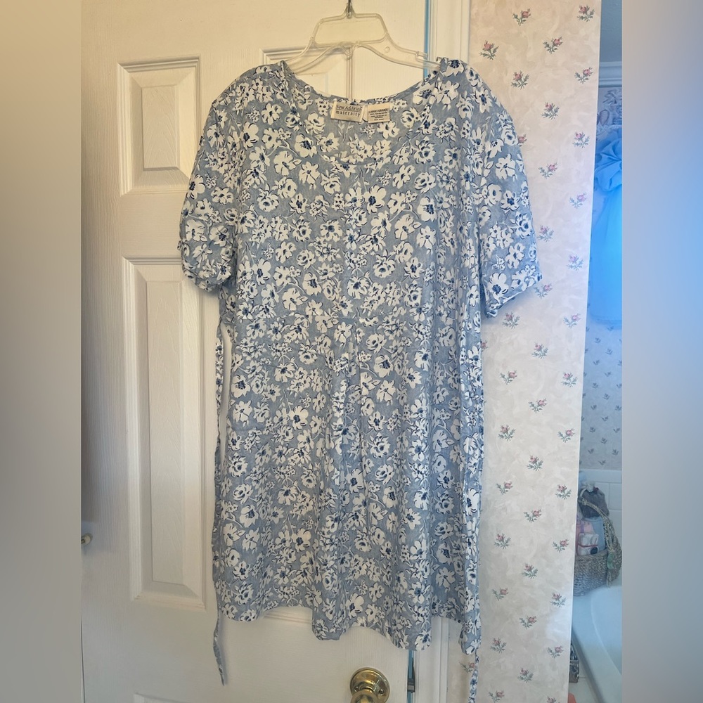 Blue maternity top with white flowers
